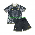 Camisolas de futebol Real Madrid Versace Edition Criança Equipamento Principal Preto 2024/25 Manga Curta